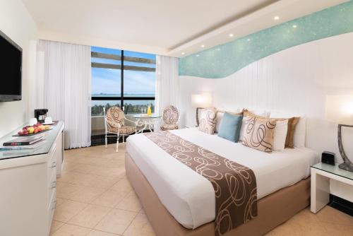 Katil atau katil-katil dalam bilik di Grand Oasis Cancun - All Inclusive