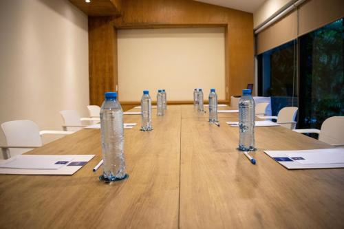 a long table with bottles of water on it at Oh! Cancun - The Urban Oasis & Beach Club in Cancún