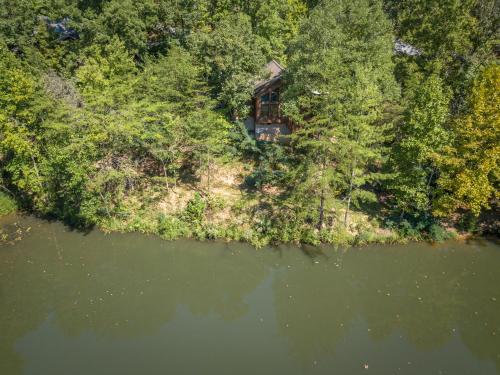 an aerial view of a house next to a lake at Reflections in Sevierville