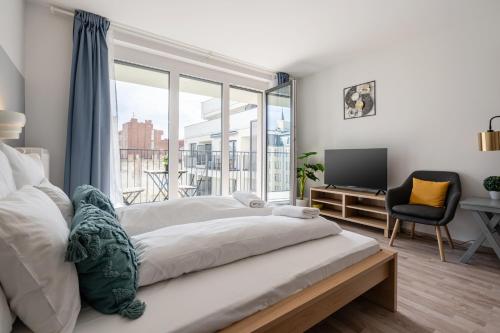 Posteľ alebo postele v izbe v ubytovaní River Sunshine Apartment