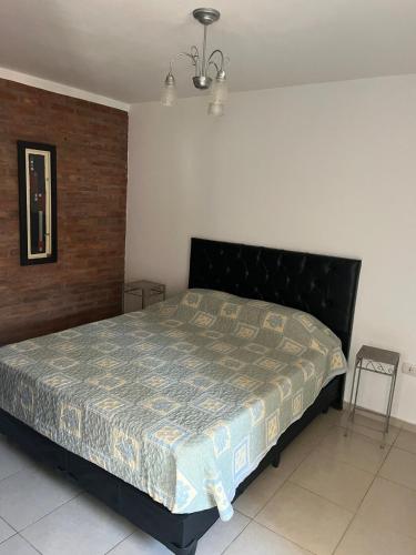 Ένα ή περισσότερα κρεβάτια σε δωμάτιο στο Apartment Rivadavia