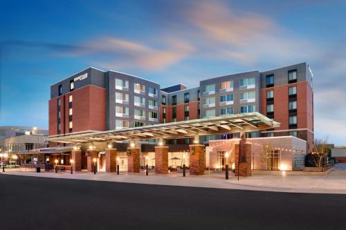 a rendering of a hotel with a building at Courtyard Lincoln Downtown in Lincoln