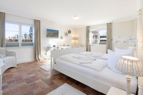 Postel nebo postele na pokoji v ubytování Amata