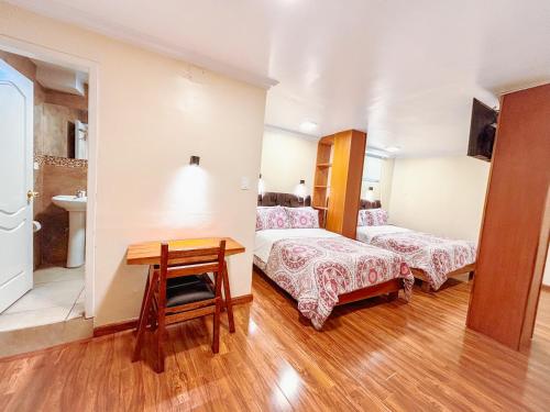 Postel nebo postele na pokoji v ubytování Hotel David