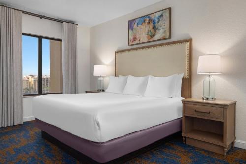 Ένα ή περισσότερα κρεβάτια σε δωμάτιο στο Club Wyndham Bonnet Creek
