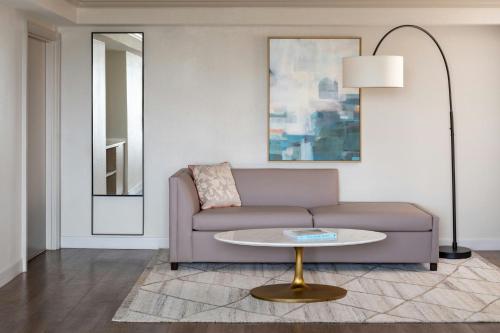 a living room with a couch and a table at St. Petersburg Marriott Clearwater in St Petersburg