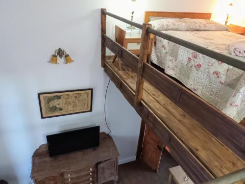 Postel nebo postele na pokoji v ubytování Monoambiente en casa historica