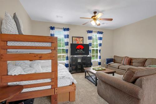 a living room with a bunk bed and a couch at Something Special Too in Canyon Lake