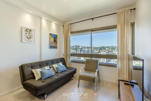 Χώρος καθιστικού στο AIR - Apartamentos bem localizados em Porto Alegre/RS