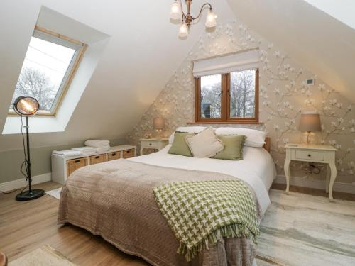 Ένα ή περισσότερα κρεβάτια σε δωμάτιο στο Pheasants Rise Apartment