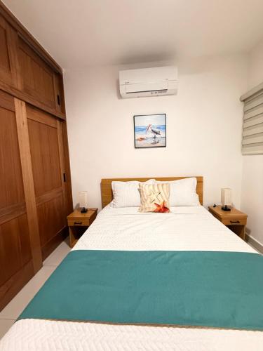 Ένα ή περισσότερα κρεβάτια σε δωμάτιο στο GH Condos by Sunrise3