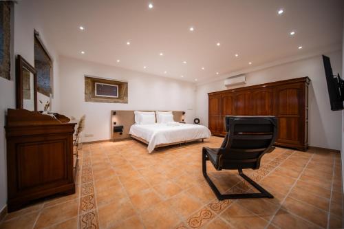 Ένα ή περισσότερα κρεβάτια σε δωμάτιο στο Quinta da Victória by venimar