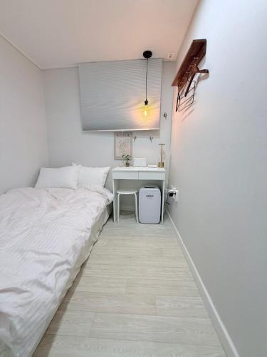 Letto o letti in una camera di GreeneStay Sindang DDP Seoul