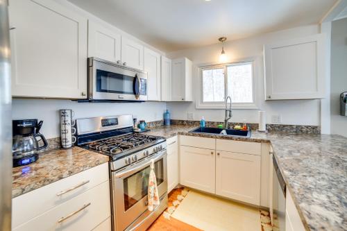 Dapur atau dapur kecil di Manistique Lake Retreat with Dock!
