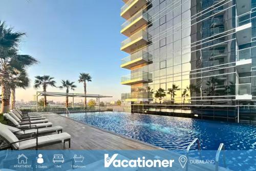 an architectural rendering of a building with a swimming pool at Carson C - Spacious Studio with Golf Course Views in Dubai Marina