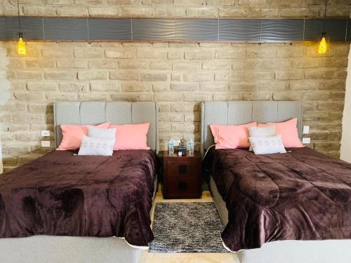 Katil atau katil-katil dalam bilik di Hotel Boutique Embrujo Intuición