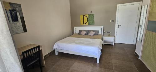 Postel nebo postele na pokoji v ubytování Endless Summer Apartments
