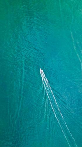 a boat in the middle of the water at The Humpback Turtle in El Valle