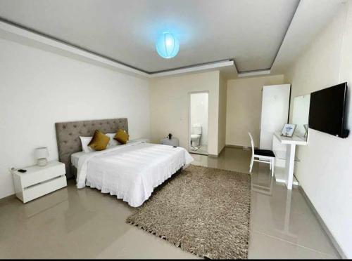 Postel nebo postele na pokoji v ubytování Residencial Ru-B