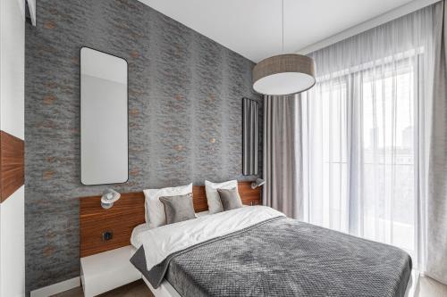 Foto CHRONOS APARTAMENTY with Parking and Air Conditioning in Warsaw Wola by Renters Prestige 2