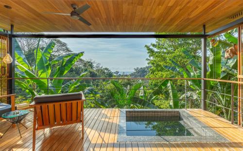a view from the deck of a house with a plunge pool at The Green House, Santa Teresa - Adults Only in Santa Teresa Beach