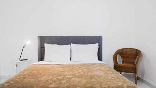 Postel nebo postele na pokoji v ubytování Arecibo Hotel 2103