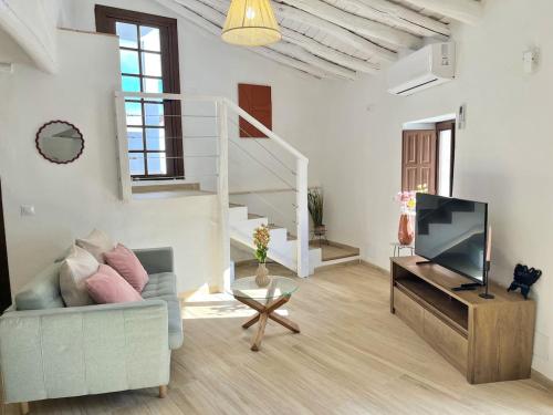 Televisyen dan/atau pusat hiburan di Casa Salome, Alojamiento con terraza y vistas al valle