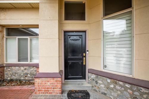 a black door on the side of a house at Scenic Hills in North Salt Lake