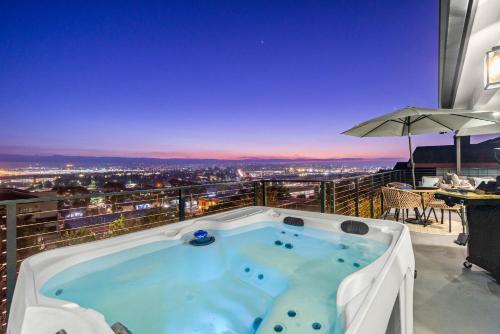 a hot tub on the balcony of a building at The California - On Top of San Diego in a Hot Tub in San Diego