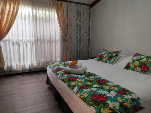 Postel nebo postele na pokoji v ubytování Hotel Hotu Matua by EI