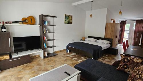 Postel nebo postele na pokoji v ubytování Apartments Betty Borik