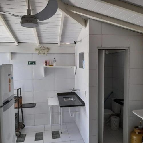 Suites Familia Otavianoにあるキッチンまたは簡易キッチン