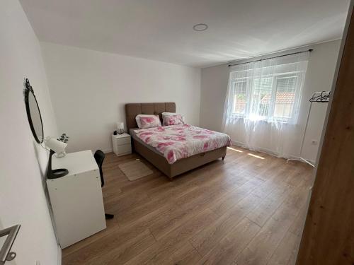 Postel nebo postele na pokoji v ubytování Apartment ANAA