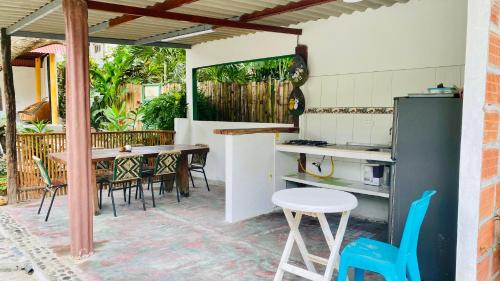 TV a/nebo společenská místnost v ubytování WAYANAY TAYRONA ECO HOSTEL
