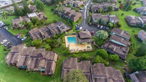 an aerial view of a house with a yard at (P17D) Hale Blue Hawaii 1Br with Loft, Puamana, Pool, Wifi in Princeville