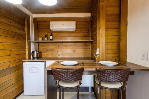 Kuchyň nebo kuchyňský kout v ubytování Pousada Solar dos Lírios - Praia do Rosa