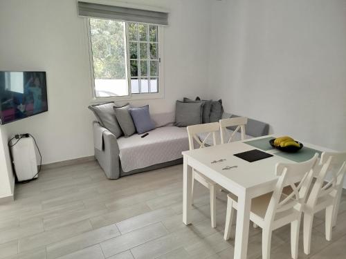 Televízia a/alebo spoločenská miestnosť v ubytovaní CASA CALAMICHE