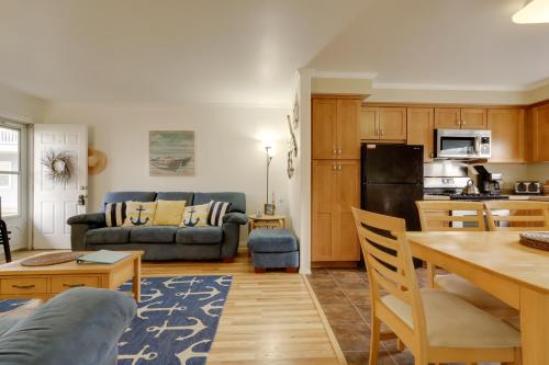 a kitchen and living room with a couch and a table at Bay Access The English Condo in Ocean City in Ocean City