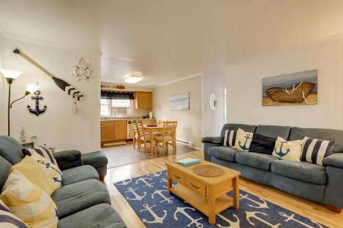 a living room with a couch and a table at Bay Access The English Condo in Ocean City in Ocean City