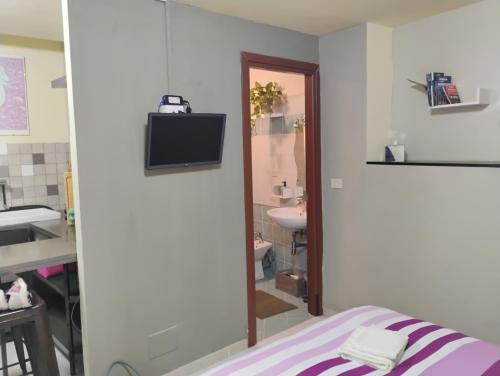 Ένα ή περισσότερα κρεβάτια σε δωμάτιο στο Casa Betti