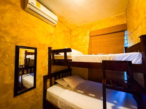 Ein Bett oder Betten in einem Zimmer der Unterkunft Villas los cabos le suisse