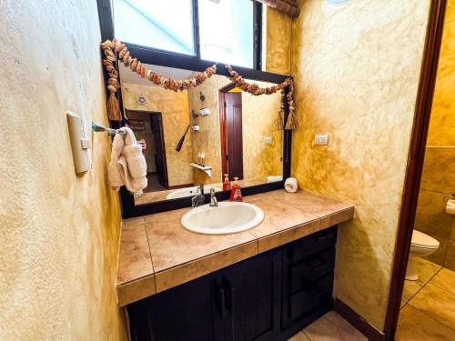Ein Badezimmer in der Unterkunft Villas los cabos le suisse