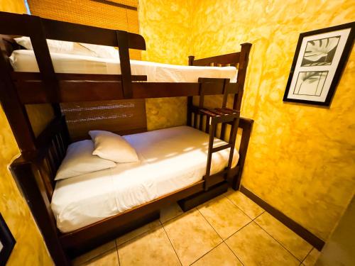 Ein Bett oder Betten in einem Zimmer der Unterkunft Villas los cabos le suisse