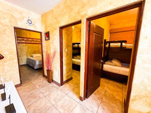 Ein Bett oder Betten in einem Zimmer der Unterkunft Villas los cabos le suisse