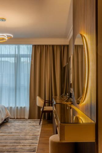 a hotel room with a mirror and a bed at Nile pearl Cairo Maadi Apartment luxury in Cairo