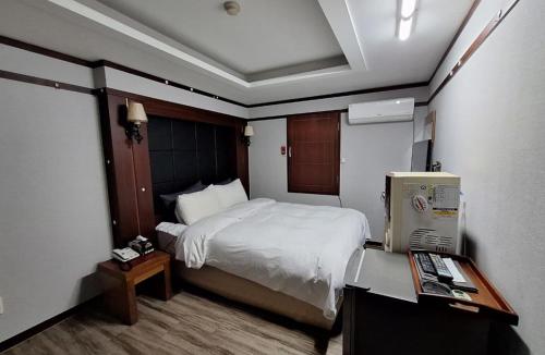 Postel nebo postele na pokoji v ubytování Greenpark Motel