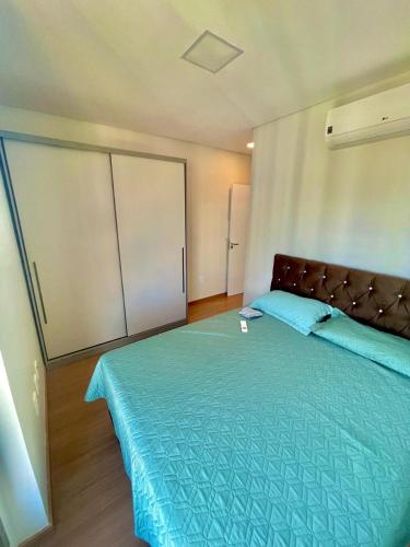 Giường trong phòng chung tại Icon - Conforto e Comodidade- Melhor Localização de Chapecó