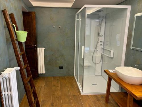 a bathroom with a shower and a sink at Borgo Residence at Tagliacozzo in Tagliacozzo