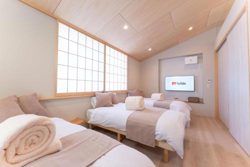 Voodi või voodid majutusasutuse Hakone Seiun toas