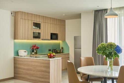 Η κουζίνα ή μικρή κουζίνα στο Noden2 Hotel & Apartment